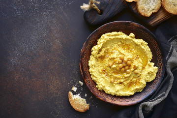 Homemade traditional lebanese chickpea hummus.Top view with copy space.