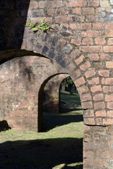 Arches and stair support pillars built in apparent brick