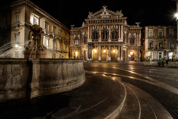 CATANIA, ITALY – theater and fountain on Piazza Vincenzo Bellini in Catania, Sicily, Italy....