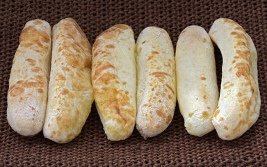Cheese bread baguette in straw basket