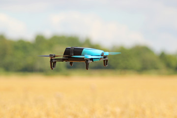 Obraz na płótnie Canvas Drone over the field
