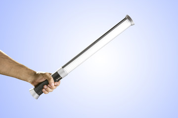 Hand holding portable magic LED tube light