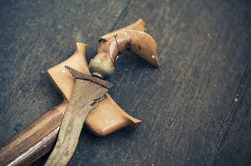malaysian heritage, antique malay dagger or Keris on wooden floor.