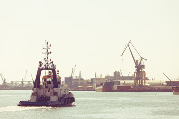 Large ship arriving in port.