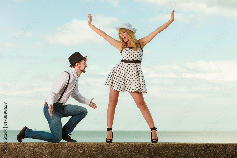 Poster loving couple retro style dating on sea coast