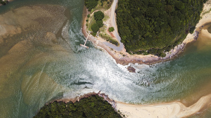 An aerial shot of river mouth area.