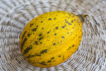 A whole fresh melon on the table