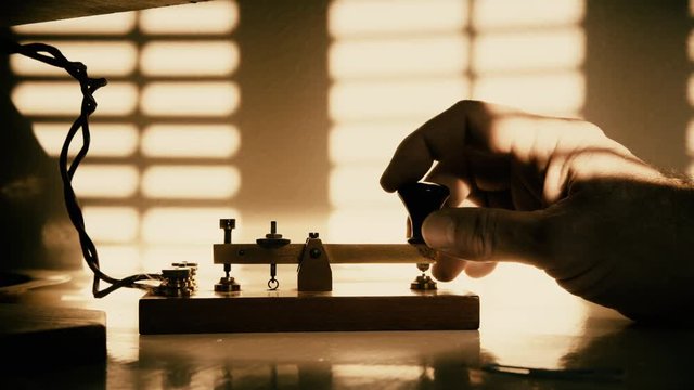 A ships telegrapher sending out morse code messages 4k