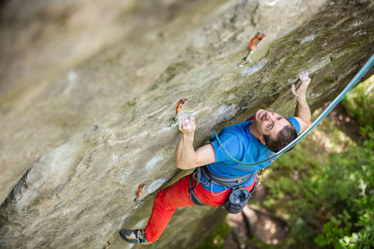 Rock climber on challenging route