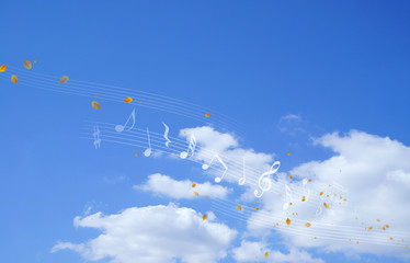 音符と枯葉と空の背景
