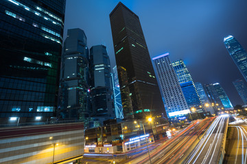 Obraz na płótnie Canvas night view of urban traffic with cityscape in Hong Kong,China.
