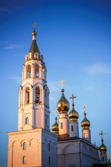 Fototapeta na wymiar the Orthodox Church at sunset in spring