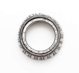 old roller bearing with traces rust, isolated on white background.