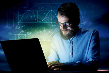 Businessman in the office at night