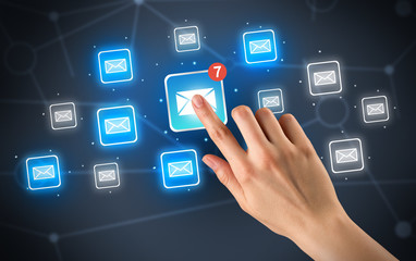 Hand touching mail icon