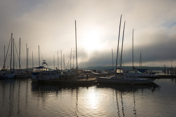 Fototapeta na wymiar Foggy mystical morning on the Saimaa lake, Lappeenranta