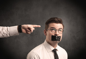 Business hand pointing at employee