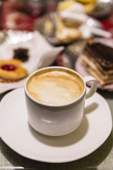 A cup of Cappuccino at cafe in winter in Darjeeling, India.