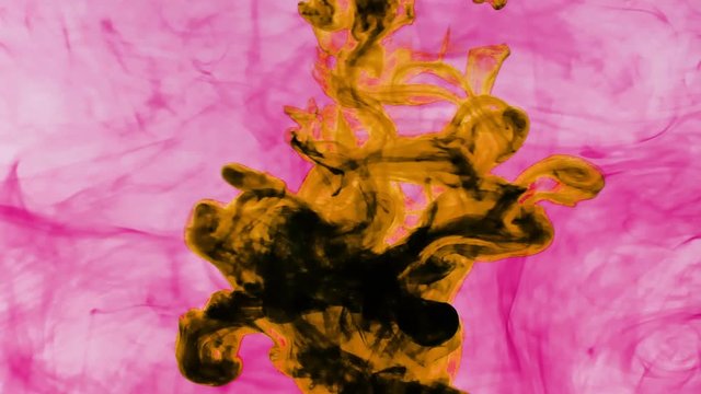 Orange and pink ink moving in water with white background in 4K resolution
