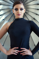 Elegant latin women dancers on big photo umbrella background