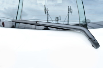 Rear windshield wiper blade on glass