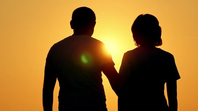 Romantic silhouette of a young couple