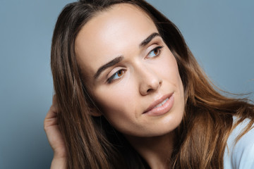 Fototapeta premium Smart attractive woman looking aside