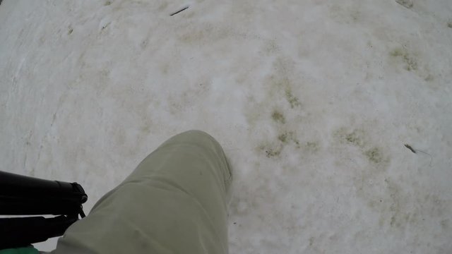 man walks through the snow on Mount Aragats, Armenia