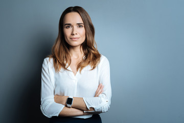 Confident beautiful businesswoman being ready to work