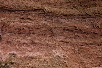 Red cliff wall near Rucamavots in Latvia