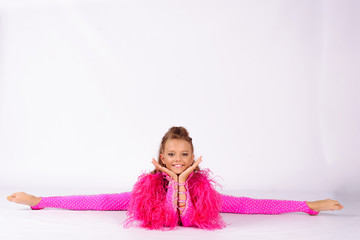 Flexible little girl gymnast doing acrobatic exercise on white background