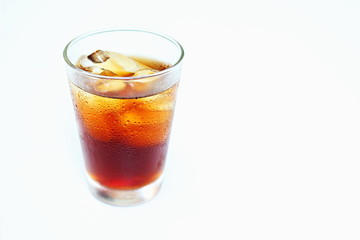 Glass of sparkling cola water