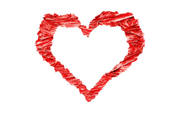 Heart shaped colorful bright red compressed wood chippings plywood frame with jagged rough edges, empty in the middle and isolated on a white background
