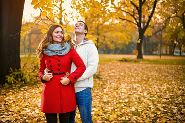 Happy romantic pair in park