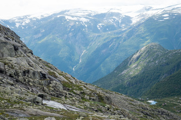 Cliff and stones in the fjord Norway