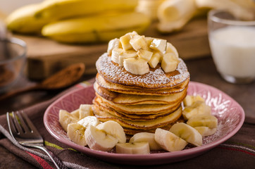 American pancakes with banana, chocolate