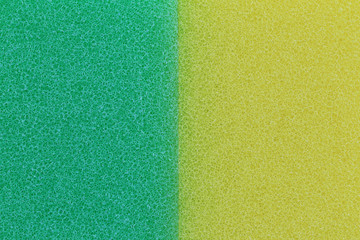 Fototapeta premium Green and yellow sponge surface background.