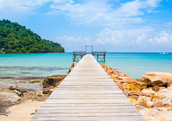 Blue sea with wooden bridge in Koh Kood Thailand.