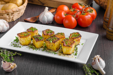 Potato fondant with garlic and herbs