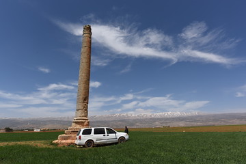 ancient roman tower in the middle of the fields in bekaa valley in lebanon