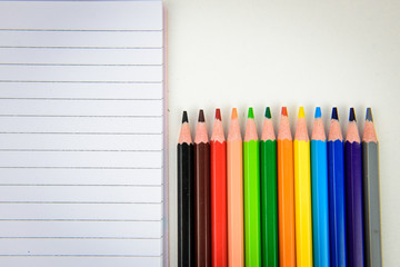 Obraz premium Rainbow of colors with school pencils school supplies and school accessories