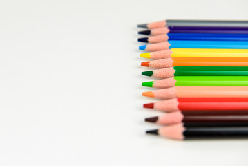 Naklejka premium Rainbow of colors with school pencils school supplies and school accessories