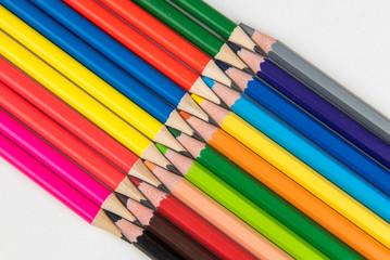 Fototapeta premium Rainbow of colors with school pencils school supplies and school accessories