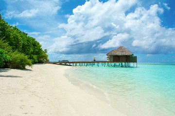 Wooden villas over water of the Indian Ocean, Maldives
