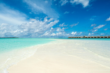 Wooden villas over water of the Indian Ocean, Maldives