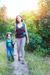 Fototapeta premium Boy and mom in the forest.