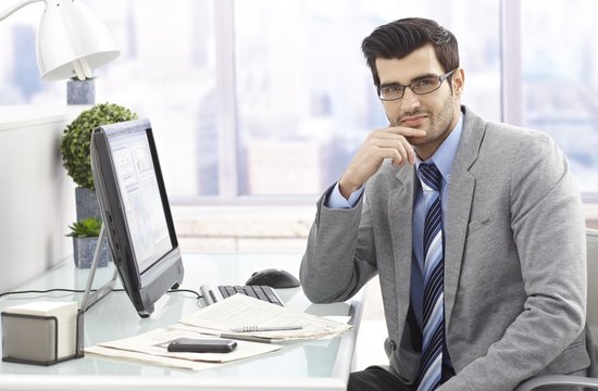 Businessman portrait at desk