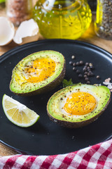 Homemade Organic Egg Baked in Avocado with Salt and Pepper