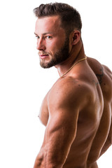 Obraz premium Handsome shirtless muscular man, standing, in studio shot, looking down, isolated on white