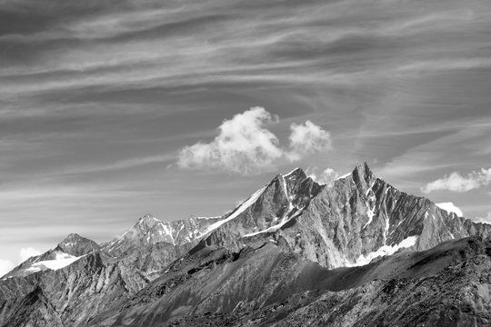 Fototapeta Beautiful fields black and white colors in the Alps